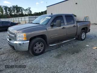 2012 Chevrolet Silverado 1500 LT с VIN 3GCPKSE75CG262557, выставлен на аукционе Copart как лот 70134165 с пробегом 210 722 миль миль и Списание • Salvage title. История ставок и продаж доступна на DreamBid. Изображение 1.
