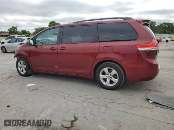 2014 Toyota Sienna LE AAS with VIN 5TDKK3DC1ES448857, listed as a Copart auction lot 61847415 with 186,586 mi miles and Salvage title. Bid and sale history available at DreamBid. Image 2.