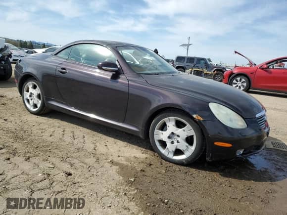 2004 Lexus SC 430 with VIN JTHFN48Y640056039, listed as a Copart auction lot 48590735 with 117,295 mi miles and Salvage title. Bid and sale history available at DreamBid. Image 4.