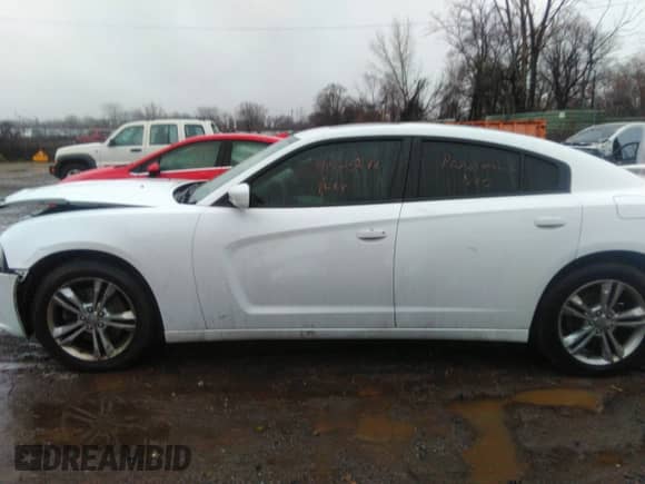 2013 Dodge Charger SXT with VIN 2C3CDXJG9DH541155, listed as a IAAI auction lot 41123246 with 118,392 mi miles and . Bid and sale history available at DreamBid. Image 14.