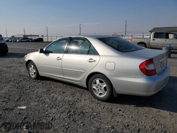 2002 Toyota Camry XLE with VIN 4T1BF32K22U541968, listed as a Copart auction lot 83992485 with 199,547 mi miles and Salvage title. Bid and sale history available at DreamBid. Image 2.