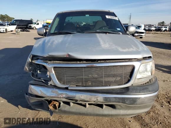 1999 Ford F-150 XL with VIN 2FTRX07W1XCA03134, listed as a Copart auction lot 41880835 with Not provided miles and Salvage title. Bid and sale history available at DreamBid. Image 5.
