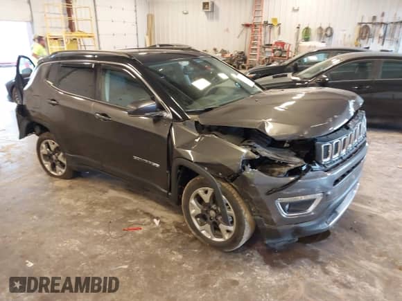 2019 Jeep Compass Limited with VIN 3C4NJDCB1KT780880, listed as a IAAI auction lot 43297174 with 76,843 mi miles and . Bid and sale history available at DreamBid. Image 1.