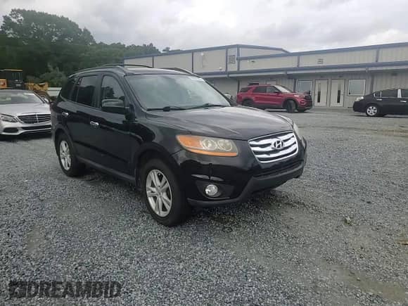 2011 Hyundai Santa Fe Limited z VIN 5XYZK3AB9BG044286, wystawiony jako Copart lot #68007995 z przebiegiem 147 180 mil mil oraz Szkoda całkowita • Salvage title. Historia ofert i sprzedaży dostępna na DreamBid. Obrazek 13.
