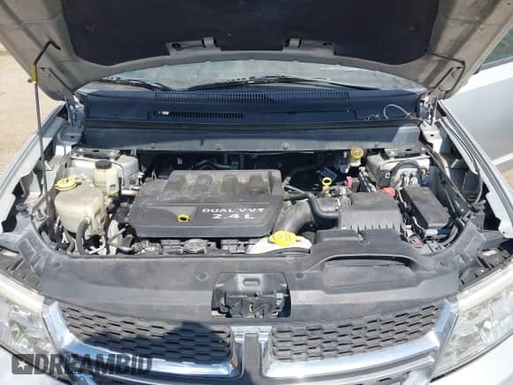 2012 Dodge Journey SE z VIN 3C4PDCAB9CT204727, wystawiony jako IAAI lot #42670588 z przebiegiem 157 007 mil mil oraz . Historia ofert i sprzedaży dostępna na DreamBid. Obrazek 10.