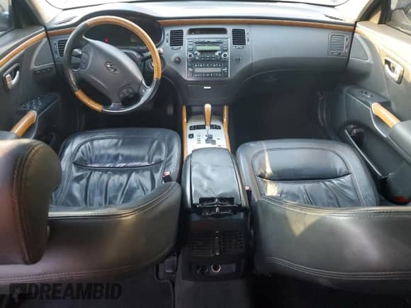 2006 Hyundai Azera SE с VIN KMHFC46F46A115686, выставлен на аукционе Copart как лот 46277665 с пробегом Не указан миль и Списание • Salvage title. История ставок и продаж доступна на DreamBid. Изображение 8.