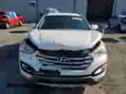 2014 Hyundai Santa Fe с VIN 5XYZU3LAXEG127728, выставлен на аукционе Copart как лот 69298855 с пробегом 98 371 миль миль и Списание • Salvage title. История ставок и продаж доступна на DreamBid. Изображение 5.