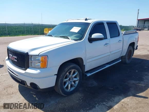 2012 GMC Sierra 1500 Denali z VIN 3GTP2XE27CG294122, wystawiony jako IAAI lot #42655182 z przebiegiem 194 073 mil mil oraz . Historia ofert i sprzedaży dostępna na DreamBid. Obrazek 2.