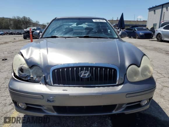 2002 Hyundai Sonata z VIN KMHWF25S72A624112, wystawiony jako Copart lot #56196195 z przebiegiem 54 206 mil mil oraz Szkoda całkowita • Salvage title. Historia ofert i sprzedaży dostępna na DreamBid. Obrazek 5.