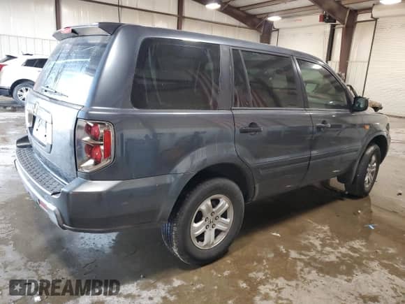2006 Honda Pilot LX с VIN 5FNYF28106B051261, выставлен на аукционе Copart как лот 80115585 с пробегом 250 897 миль миль и Списание • Salvage title. История ставок и продаж доступна на DreamBid. Изображение 3.