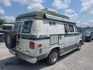 1990 Chevrolet Chevy Van with VIN 1GBEG25KXL7110285, listed as a IAAI auction lot 42875782 with 235,828 mi miles and . Bid and sale history available at DreamBid. Image 4.