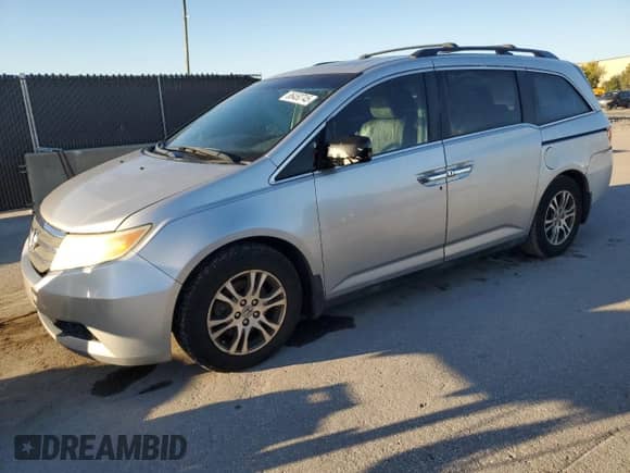 2013 Honda Odyssey EX-L z VIN 5FNRL5H63DB042917, wystawiony jako Copart lot #86450745 z przebiegiem 223 098 mil mil oraz Szkoda całkowita • Salvage title. Historia ofert i sprzedaży dostępna na DreamBid. Obrazek 1.