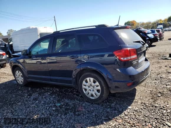 2019 Dodge Journey SE with VIN 3C4PDCBB8KT694218, listed as a Copart auction lot 82277455 with 95,788 mi miles and Salvage title. Bid and sale history available at DreamBid. Image 2.