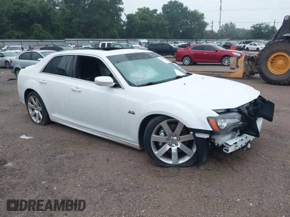 2014 Chrysler 300 SRT-8 с VIN 2C3CCAFJ6EH156853, выставлен на аукционе IAAI как лот 42370748 с пробегом 44 434 миль миль и . История ставок и продаж доступна на DreamBid. Изображение 1.