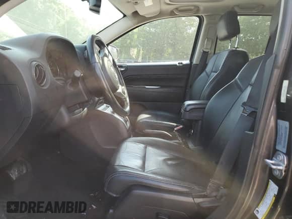 2017 Jeep Compass Latitude with VIN 1C4NJCEA3HD117971, listed as a Copart auction lot 60521815 with 73,376 mi miles and Salvage title. Bid and sale history available at DreamBid. Image 7.
