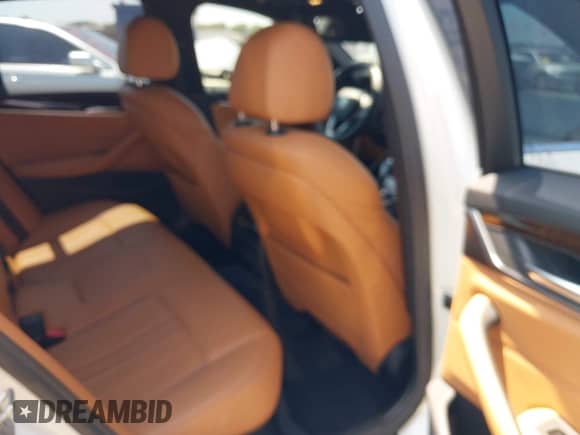 2019 BMW 5 Series 540i with VIN WBAJE5C5XKWW11726, listed as a IAAI auction lot 42320701 with 59,427 mi miles and . Bid and sale history available at DreamBid. Image 8.