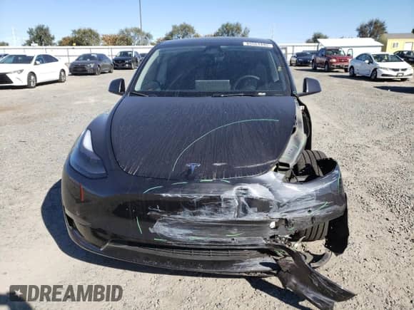2024 Tesla Model Y Long Range with VIN 7SAYGDEE6RF054205, listed as a Copart auction lot 85551495 with 21,837 mi miles and Salvage title. Bid and sale history available at DreamBid. Image 5.