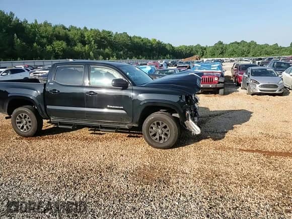 2023 Toyota Tacoma SR5 z VIN 3TMAZ5CN9PM213146, wystawiony jako Copart lot #64479895 z przebiegiem 28 057 mil mil oraz Szkoda całkowita • Salvage title. Historia ofert i sprzedaży dostępna na DreamBid. Obrazek 13.