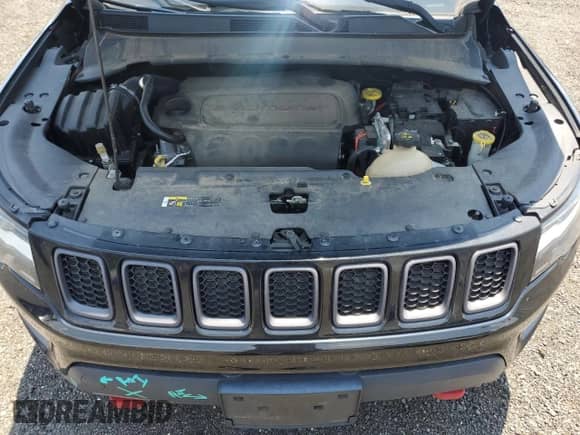 2017 Jeep Compass Trailhawk with VIN 3C4NJDDB6HT631761, listed as a Copart auction lot 62759555 with 94,528 mi miles and Salvage title. Bid and sale history available at DreamBid. Image 12.