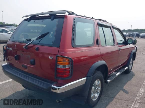 1997 Nissan Pathfinder XE with VIN JN8AR05Y9VW143756, listed as a IAAI auction lot 42409397 with 89,911 mi miles and . Bid and sale history available at DreamBid. Image 4.