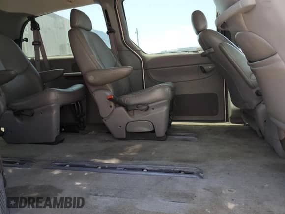 2000 Dodge Caravan LE with VIN 1B4GP54L8YB691240, listed as a Copart auction lot 66009235 with 181,026 mi miles and Salvage title. Bid and sale history available at DreamBid. Image 11.