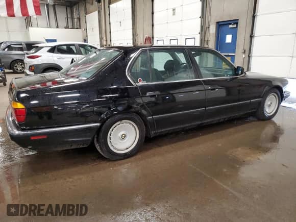 1988 BMW 7 Series with VIN WBAGC8313J2765568, listed as a Copart auction lot 59484085 with 81,010 mi miles and Salvage title. Bid and sale history available at DreamBid. Image 3.