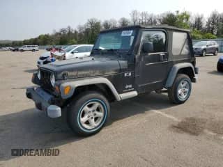 2003 Jeep Wrangler X z VIN 1J4FA39S23P359983, wystawiony jako Copart lot #59469005 z przebiegiem 118 585 mil mil oraz Czysty tytuł • Clean title. Historia ofert i sprzedaży dostępna na DreamBid. Obrazek 1.