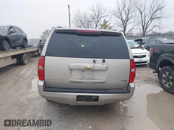 2009 Chevrolet Suburban LT with VIN 1GNFK16309R259972, listed as a IAAI auction lot 41568798 with 327,218 mi miles and . Bid and sale history available at DreamBid. Image 16.