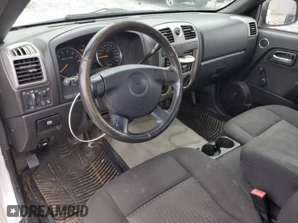 2010 Chevrolet Colorado Work Truck z VIN 1GCCSBD96A8114051, wystawiony jako Copart lot #67944105 z przebiegiem 211 030 mil mil oraz Szkoda całkowita • Salvage title. Historia ofert i sprzedaży dostępna na DreamBid. Obrazek 8.