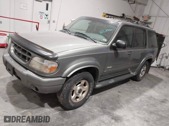 2001 Ford Explorer Limited with VIN 1FMDU75E41ZA85632, listed as a IAAI auction lot 43415870 with 165,854 mi miles and . Bid and sale history available at DreamBid. Image 2.