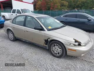 1999 Saturn SL with VIN 1G8ZK5277XZ247802, listed as a IAAI auction lot 43218660 with 80,626 mi miles and . Bid and sale history available at DreamBid. Image 1.