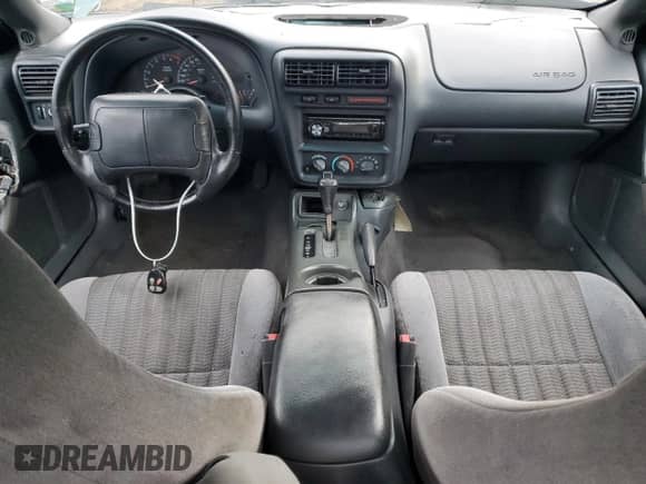 1998 Chevrolet Camaro z VIN 2G1FP22K7W2113539, wystawiony jako Copart lot #79086334 z przebiegiem Nie podano mil oraz Czysty tytuł • Clean title. Historia ofert i sprzedaży dostępna na DreamBid. Obrazek 8.