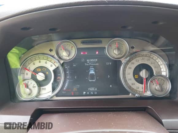 2015 Ram 1500 Laramie Longhorn with VIN 1C6RR7PM7FS606530, listed as a IAAI auction lot 42909293 with 179,250 mi miles and . Bid and sale history available at DreamBid. Image 7.