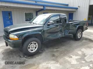2002 Dodge Dakota with VIN 1B7GG12X32S604952, listed as a Copart auction lot 70287474 with 261,050 mi miles and Non repairable. Bid and sale history available at DreamBid. Image 1.