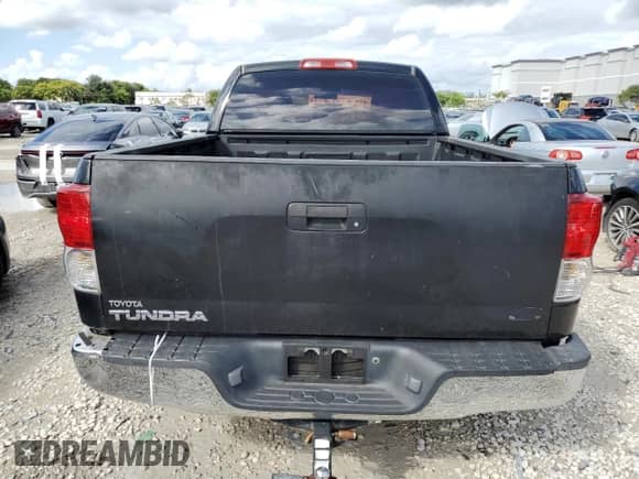 2012 Toyota Tundra z VIN 5TFRU5F13CX026371, wystawiony jako Copart lot #77576564 z przebiegiem 112 512 mil mil oraz Szkoda całkowita • Salvage title. Historia ofert i sprzedaży dostępna na DreamBid. Obrazek 6.