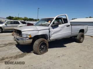 1999 Dodge 2500 with VIN 3B7KF236XXG174036, listed as a Copart auction lot 66036345 with Not provided miles and Salvage title. Bid and sale history available at DreamBid. Image 1.