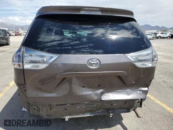 2013 Toyota Sienna SE with VIN 5TDXK3DCXDS347384, listed as a Copart auction lot 70305815 with 94,648 mi miles and Salvage title. Bid and sale history available at DreamBid. Image 6.