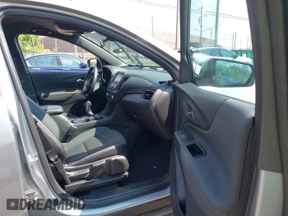 2023 Chevrolet Equinox RS z VIN 3GNAXMEG7PL163875, wystawiony jako IAAI lot #42894655 z przebiegiem 38 549 mil mil oraz . Historia ofert i sprzedaży dostępna na DreamBid. Obrazek 5.