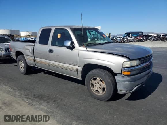 2001 Chevrolet Silverado 1500 LS z VIN 1GCEK19T81E123004, wystawiony jako Copart lot #90468215 z przebiegiem Nie podano mil oraz Czysty tytuł • Clean title. Historia ofert i sprzedaży dostępna na DreamBid. Obrazek 4.