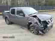 2021 Nissan Frontier Pro-4X with VIN 1N6ED0EB3MN700394, listed as a Copart auction lot 51048235 with 156,875 mi miles and Salvage title. Bid and sale history available at DreamBid. Image 4.