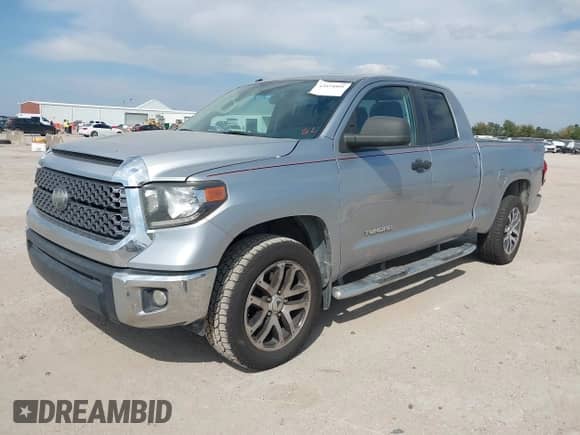2018 Toyota Tundra SR5 z VIN 5TFRM5F14JX125410, wystawiony jako IAAI lot #43474801 z przebiegiem 177 267 mil mil oraz . Historia ofert i sprzedaży dostępna na DreamBid. Obrazek 2.