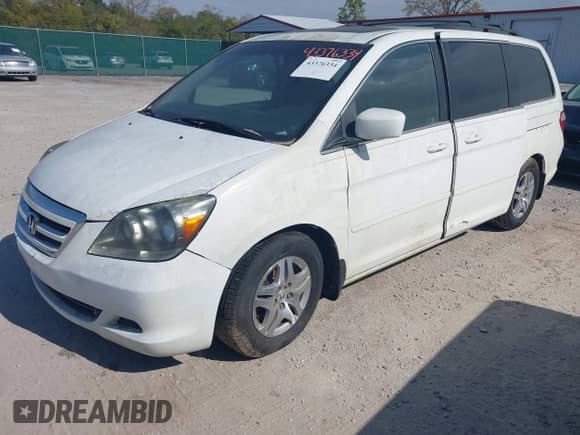 2007 Honda Odyssey EX-L z VIN 5FNRL38677B435716, wystawiony jako IAAI lot #43376334 z przebiegiem 253 875 mil mil oraz . Historia ofert i sprzedaży dostępna na DreamBid. Obrazek 2.