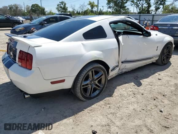 2009 Ford Mustang Shelby GT500 с VIN 1ZVHT88S295130535, выставлен на аукционе Copart как лот 72680554 с пробегом 69 646 миль миль и Списание • Salvage title. История ставок и продаж доступна на DreamBid. Изображение 3.