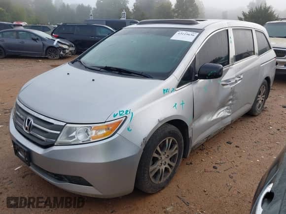 2013 Honda Odyssey EX-L with VIN 5FNRL5H64DB020229, listed as a IAAI auction lot 43119656 with 149,509 mi miles and . Bid and sale history available at DreamBid. Image 17.