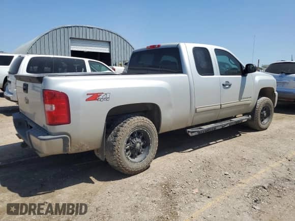 2011 Chevrolet Silverado 1500 LT with VIN 1GCRKSE32BZ307734, listed as a Copart auction lot 66521355 with 106,507 mi miles and Salvage title. Bid and sale history available at DreamBid. Image 3.