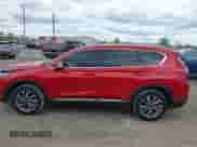 2019 Hyundai Santa Fe Ultimate z VIN 5NMS5CAD9KH026094, wystawiony jako IAAI lot #42316150 z przebiegiem 106 264 mil mil oraz . Historia ofert i sprzedaży dostępna na DreamBid. Obrazek 14.