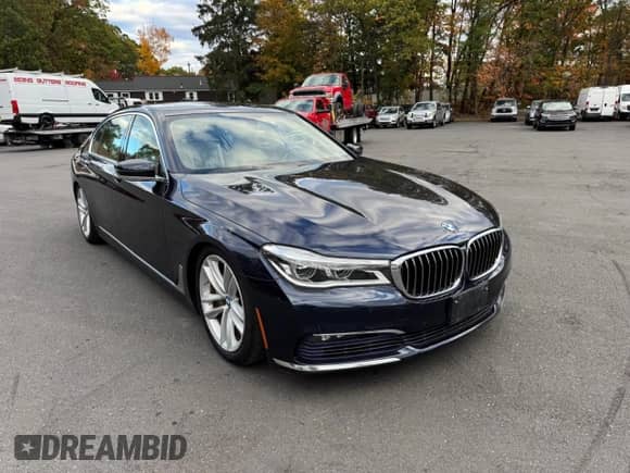 2016 BMW 7 Series 750i xDrive с VIN WBA7F2C51GG417271, выставлен на аукционе Copart как лот 90135155 с пробегом 92 844 миль миль и Чистый • Clean title. История ставок и продаж доступна на DreamBid. Изображение 4.