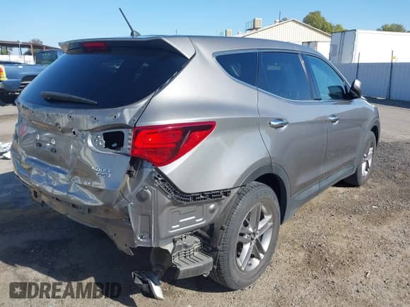 2018 Hyundai Santa Fe 2.4L with VIN 5NMZTDLB9JH084453, listed as a IAAI auction lot 43428772 with 103,023 mi miles and . Bid and sale history available at DreamBid. Image 4.