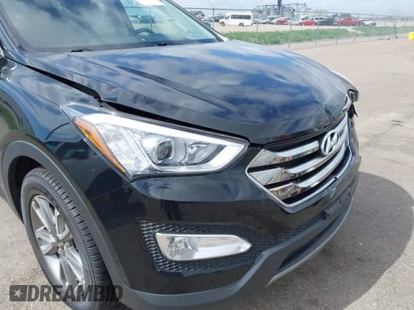 2016 Hyundai Santa Fe z VIN 5XYZUDLA9GG371704, wystawiony jako IAAI lot #42287648 z przebiegiem 118 442 mil mil oraz . Historia ofert i sprzedaży dostępna na DreamBid. Obrazek 17.
