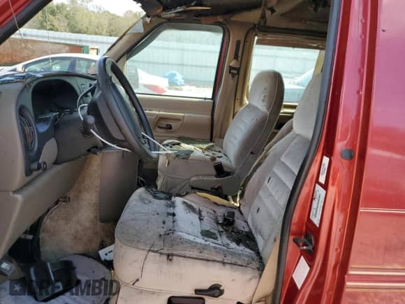 1999 Ford Econoline Cargo with VIN 1FDRE14W5XHB72755, listed as a Copart auction lot 78891634 with 136,376 mi miles and Salvage title. Bid and sale history available at DreamBid. Image 7.
